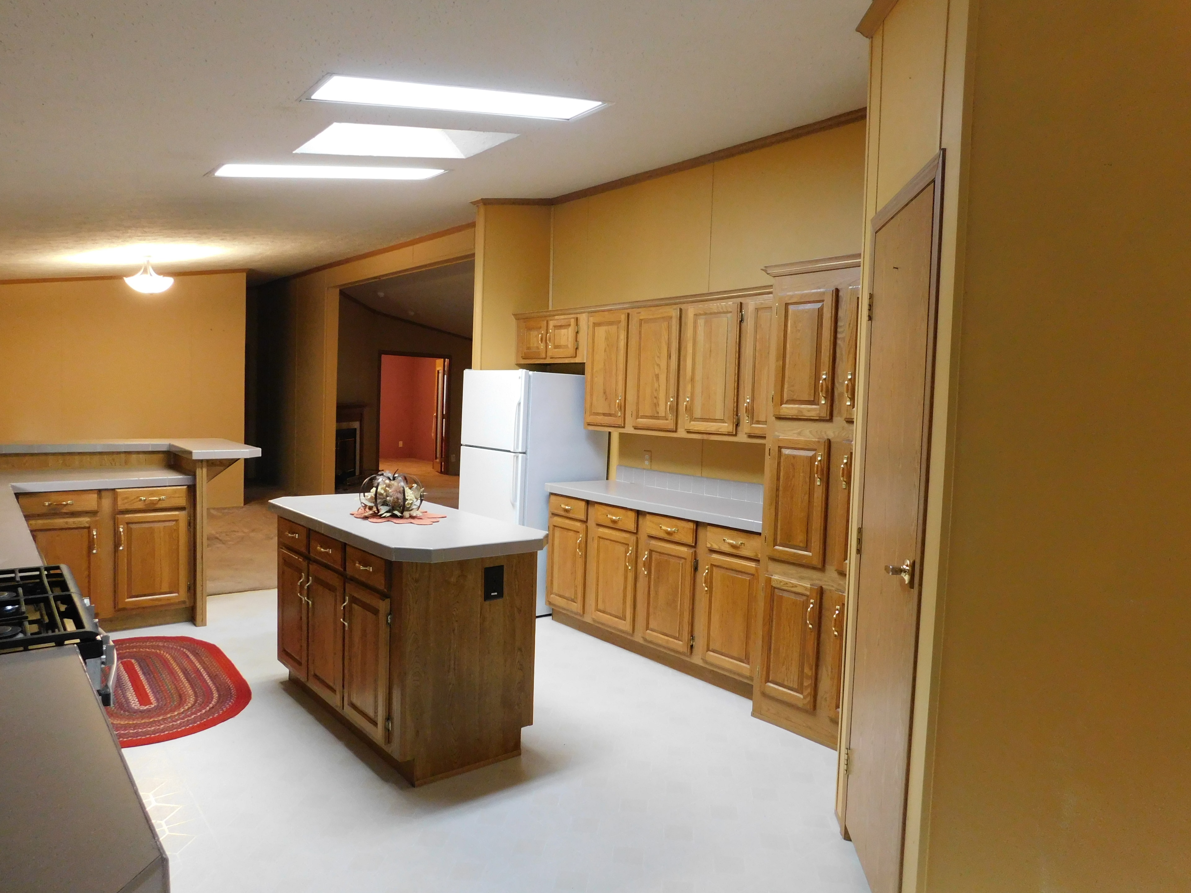 Kitchen — refrigerator and pantry cabinets